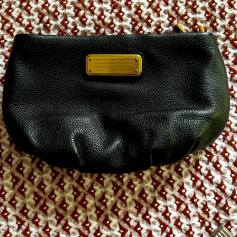 Marc Jacob’s clutch with strap